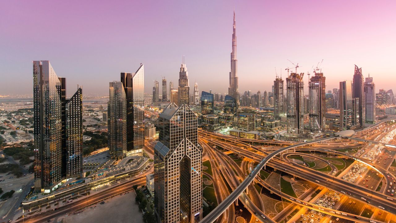 dubai sky line image Dubai skyline image of buildings and road